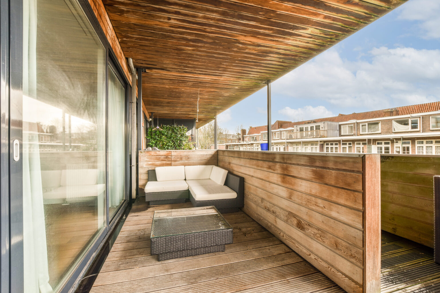 a-terrace-with-a-couch-and-a-wooden-roof-2025-02-10-05-48-42-utc